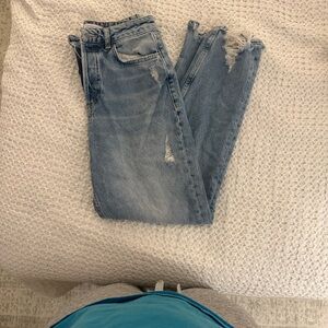Women's Light Blue Distressed Jeans